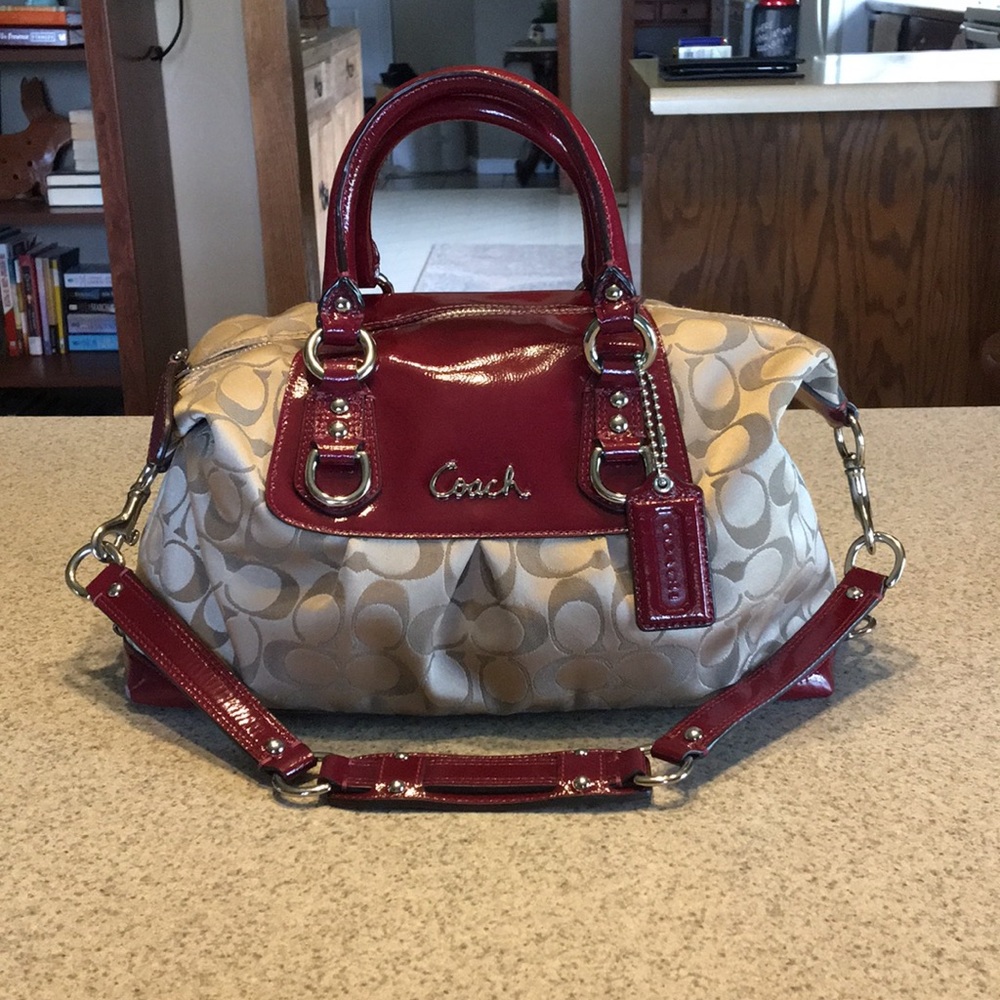 Coach Satchel - Signature print with Dk red trim.